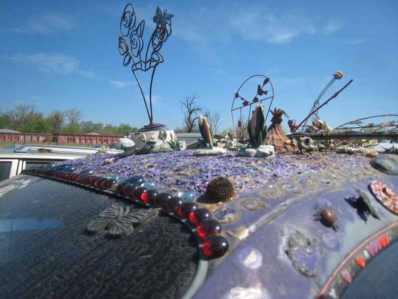 Illustration for article titled Groovalicious Purple Princess Of Peace Art Car Falls On Hard Times, Faces Crusher